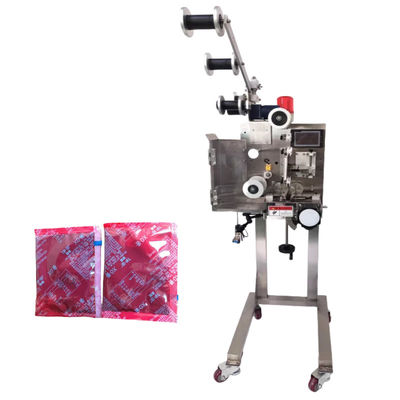 Verzorgingsmachine voor het inbrengen van droogmiddel van papier, kunststof, aluminiumfolie 100 pakketten per minuut